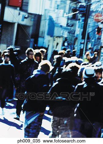 Crowd of people walking in Tokyo street View Large Photo Image Stock Photography - Crowd of people walking in Tokyo street. Fotosearch