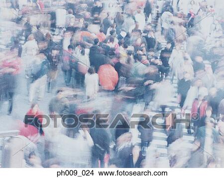 Picture - Large crowd of people crossing city street, Shibuya, Tokyo, Japan. Fotosearch