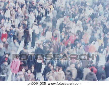 Stock Photography - Large crowd of people crossing city street, Shibuya, Tokyo, Japan . Fotosearch
