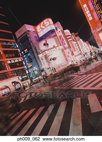 Pedestrians crossing street, night, Shibuya-ku, Tokyo, Japan View Large Photo Image Stock Image - Pedestrians crossing street, night, Shibuya-ku, Tokyo, Japan. Fotosearch