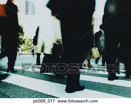 People crossing city street, Shibuya, Tokyo, Japan (blurred motion) View Large Photo Image Stock Photo - People crossing city street, Shibuya, Tokyo, Japan (blurred motion). Fotosearch