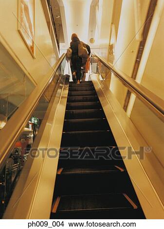 People on escalator View Large Photo Image Picture - People on escalator. Fotosearch
