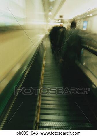 People on travelator (blurred motion) View Large Photo Image Stock Photography - People on travelator (blurred motion). Fotosearch