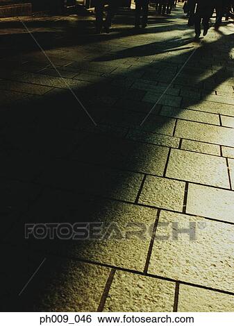 Shadow of people on street View Large Photo Image Stock Photograph - Shadow of people on street. Fotosearch