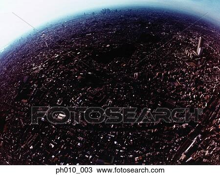 Stock Image - An aerial fisheye lens view of Toshima-ku, Tokyo, Japan. Fotosearch
