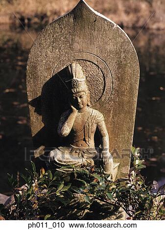 A statue of a Buddha View Large Photo Image Stock Image - A statue of a Buddha. Fotosearch