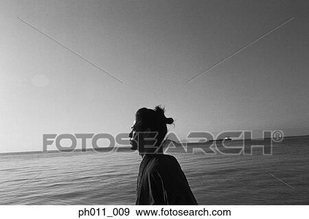 Samurai warrior standing at the seaside View Large Photo Image Stock Photo - Samurai warrior standing at the seaside. Fotosearch