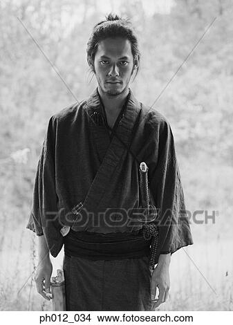Picture - Portrait of a Japanese man in traditional costume. Fotosearch