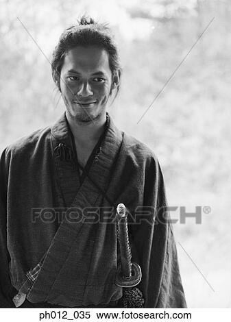 Stock Photography - Portrait of a Japanese man in traditional costume. Fotosearch