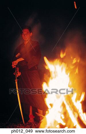 Samurai warrior standing at the door View Large Photo Image Stock Photo - Samurai warrior standing at the door. Fotosearch