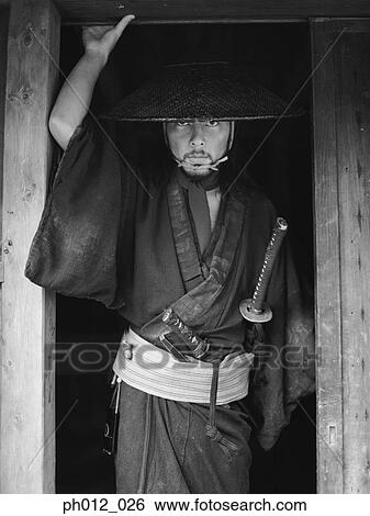 Stock Photograph - Samurai warrior standing at the door. Fotosearch