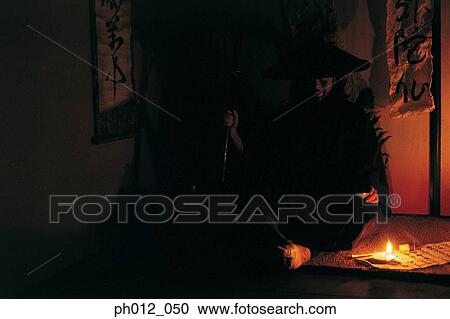 Samurai warrior standing in a room View Large Photo Image Stock Image - Samurai warrior standing in a room. Fotosearch