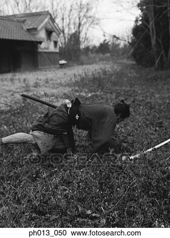 Samurai warrior falling to the ground View Large Photo Image Stock Image - Samurai warrior falling to the ground. Fotosearch
