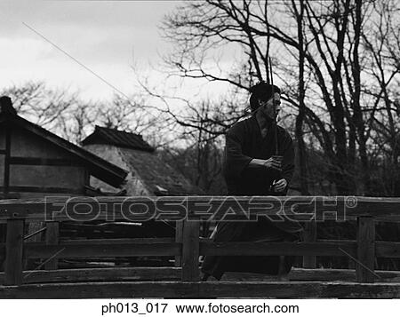 Samurai warrior practicing sword play View Large Photo Image Stock Photo - Samurai warrior practicing sword play. Fotosearch