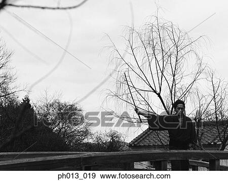 Samurai warrior practicing sword play View Large Photo Image Stock Photo - Samurai warrior practicing sword play. Fotosearch