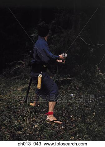Samurai warrior striking an attack View Large Photo Image Stock Image - Samurai warrior striking an attack. Fotosearch