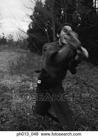 Samurai warrior striking an attack View Large Photo Image Stock Photo - Samurai warrior striking an attack. Fotosearch