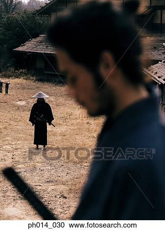 Confrontation of two Samurai warriors View Large Photo Image Stock Image - Confrontation of two Samurai warriors. Fotosearch