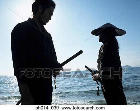 Confrontation of two Samurai warriors View Large Photo Image Stock Photo - Confrontation of two Samurai warriors. Fotosearch