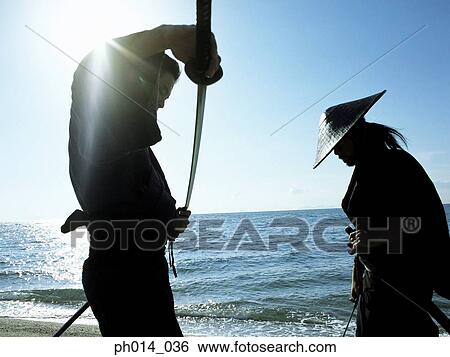 Confrontation of two Samurai warriors View Large Photo Image Stock Photograph - Confrontation of two Samurai warriors. Fotosearch