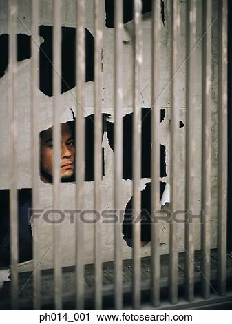 Stock Image - Portrait of a Japanese man in traditional costume. Fotosearch
