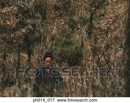 Stock Photo - Portrait of a Japanese man in traditional costume. Fotosearch