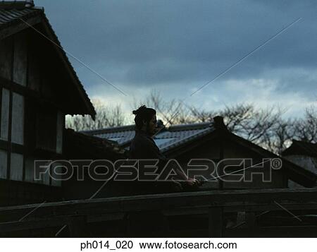 Samurai warrior practicing sword play View Large Photo Image Stock Image - Samurai warrior practicing sword play. Fotosearch