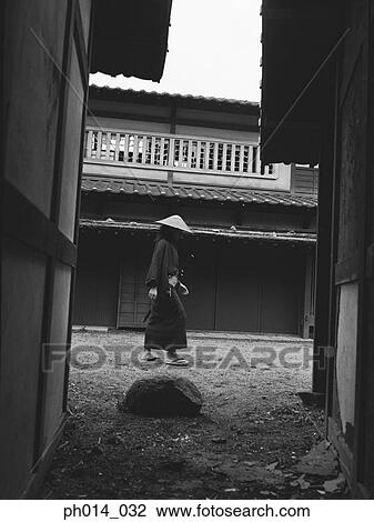 Samurai warrior walking in an estate View Large Photo Image Stock Image - Samurai warrior walking in an estate. Fotosearch