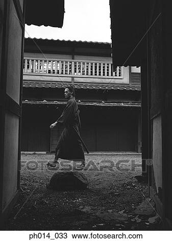 Samurai warrior walking in an estate View Large Photo Image Stock Image - Samurai warrior walking in an estate. Fotosearch