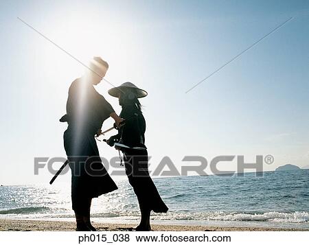 Confrontation of two Samurai warriors View Large Photo Image Stock Photo - Confrontation of two Samurai warriors. Fotosearch