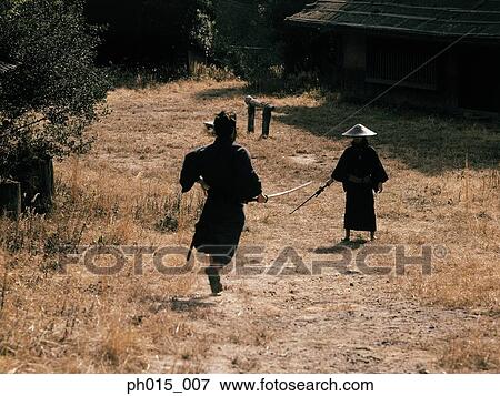 Stock Photo - Samurai warrior attacks with a sword. Fotosearch