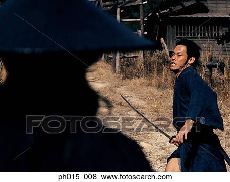 Samurai warrior attacks with a sword View Large Photo Image Stock Photo - Samurai warrior attacks with a sword. Fotosearch
