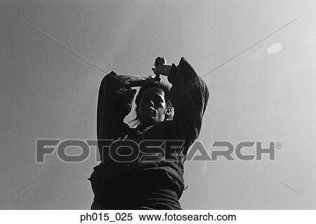 Stock Photography - Samurai warrior attacks with a sword. Fotosearch