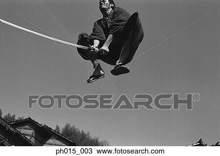 Samurai warrior jump attack with a sword View Large Photo Image Stock Image - Samurai warrior jump attack with a sword. Fotosearch