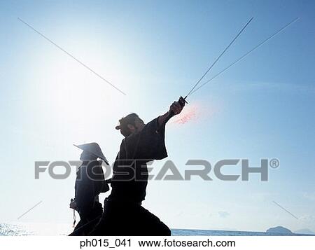 Two Samurai warriors fighting View Large Photo Image Stock Image - Two Samurai warriors fighting. Fotosearch