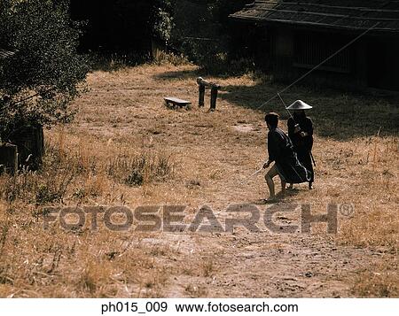 Stock Photo - Two Samurai warriors fighting. Fotosearch