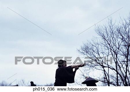 Two Samurai warriors fighting View Large Photo Image Stock Photograph - Two Samurai warriors fighting. Fotosearch