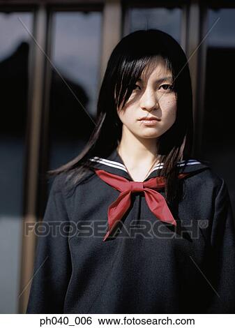 School girl in front of the window View Large Photo Image Stock Photograph - School girl in front of the window. Fotosearch