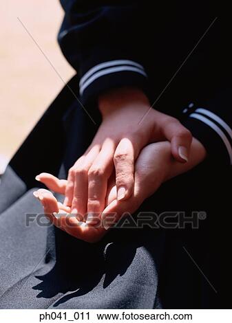 Stock Image - A pair of woman's hands. Fotosearch