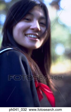 Stock Image - Portrait of an Asian woman . Fotosearch