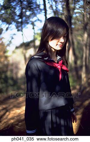 School girl standing in the park View Large Photo Image Stock Photography - School girl standing in the park. Fotosearch