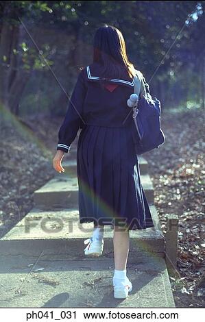 School girl walking up the steps View Large Photo Image Stock Image - School girl walking up the steps. Fotosearch