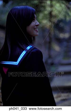 Side view of an Asian woman View Large Photo Image Stock Image - Side view of an Asian woman. Fotosearch