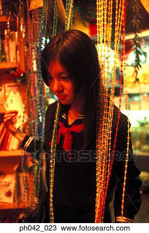 School girl at a shop View Large Photo Image Stock Image - School girl at a shop. Fotosearch