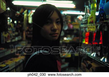 School girl at a shop View Large Photo Image Stock Image - School girl at a shop. Fotosearch