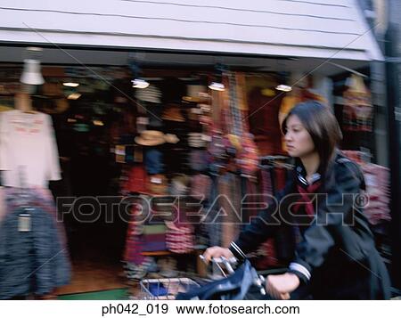 School girl cycling View Large Photo Image Stock Photo - School girl cycling. Fotosearch