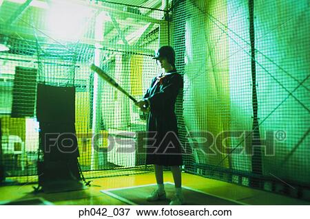 School girl holding a baseball bat View Large Photo Image Stock Photo - School girl holding a baseball bat. Fotosearch