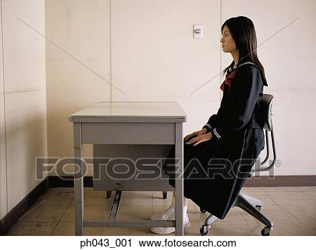 School girl sitting in the classroom View Large Photo Image Stock Image - School girl sitting in the classroom. Fotosearch