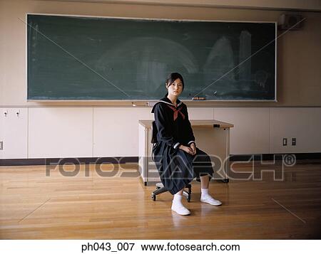 School girl sitting in the classroom View Large Photo Image Stock Photo - School girl sitting in the classroom. Fotosearch