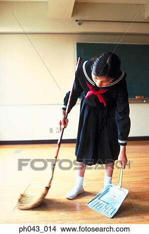 School girl sweeping the floor View Large Photo Image Picture - School girl sweeping the floor. Fotosearch